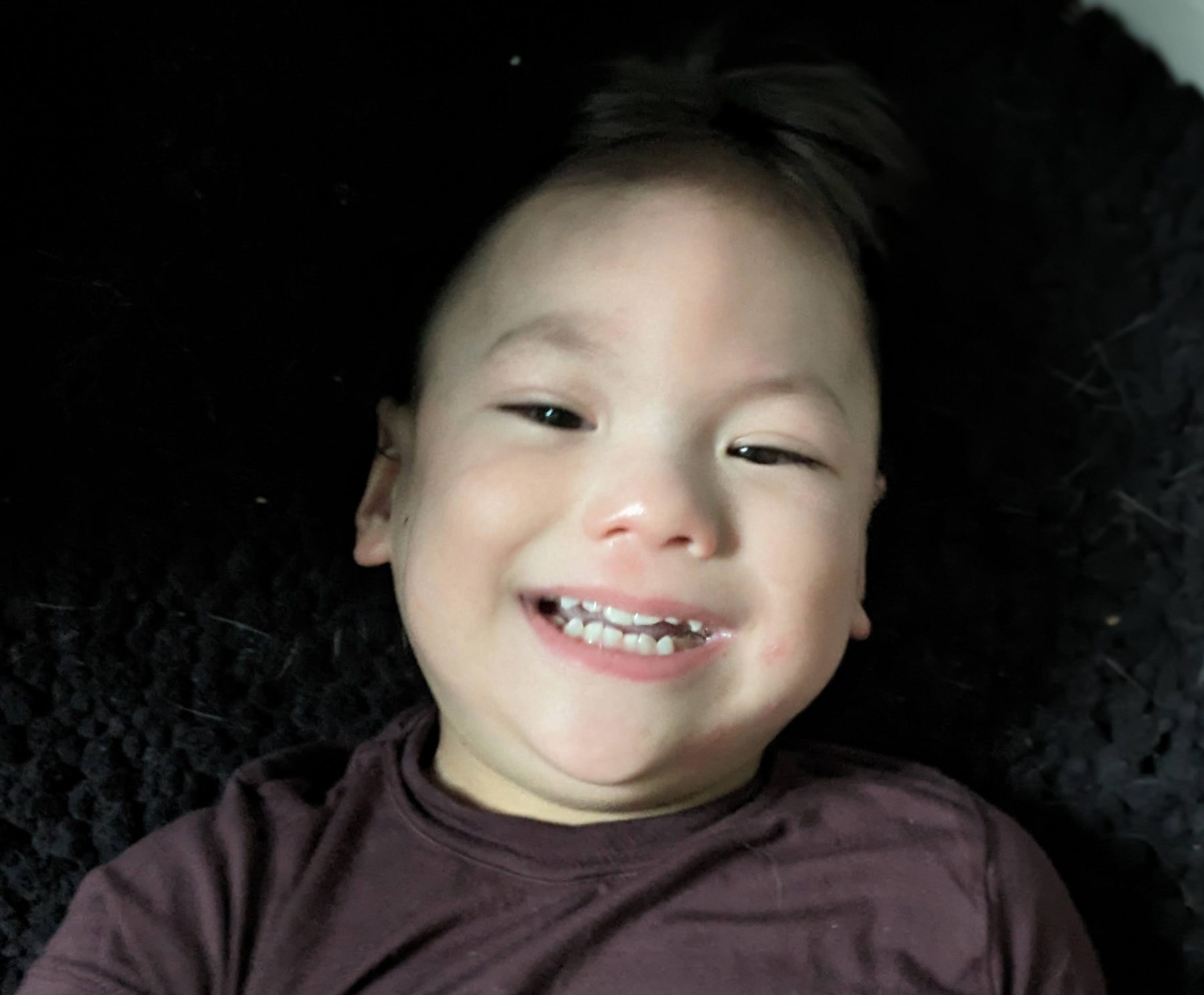 Leo, smiling